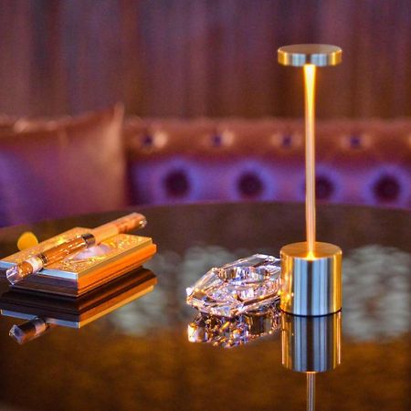 Century Marina Hotel - Lusail Bagian luar foto The table lamp