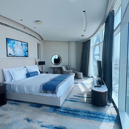 Century Marina Hotel - Lusail Bagian luar foto A bedroom at the hotel