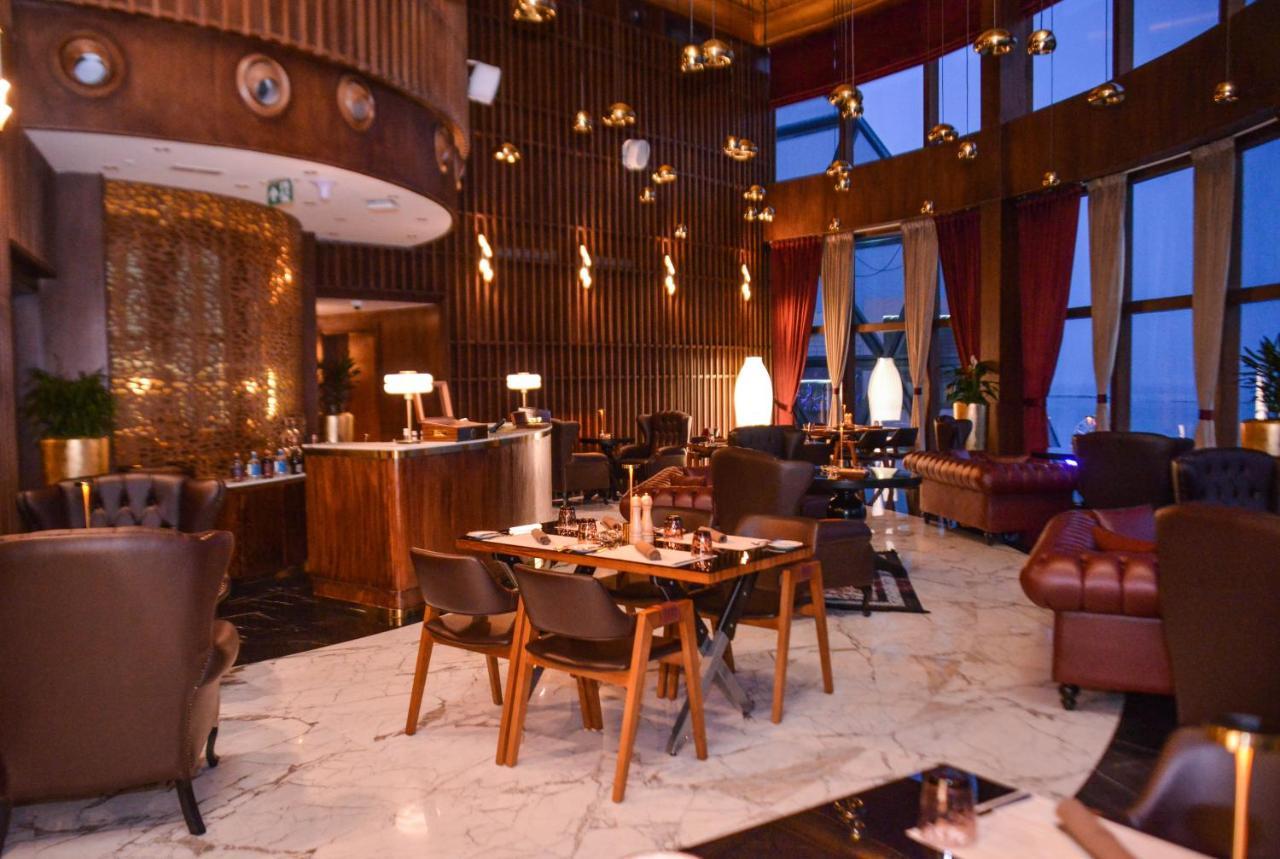 Century Marina Hotel - Lusail Bagian luar foto The restaurant