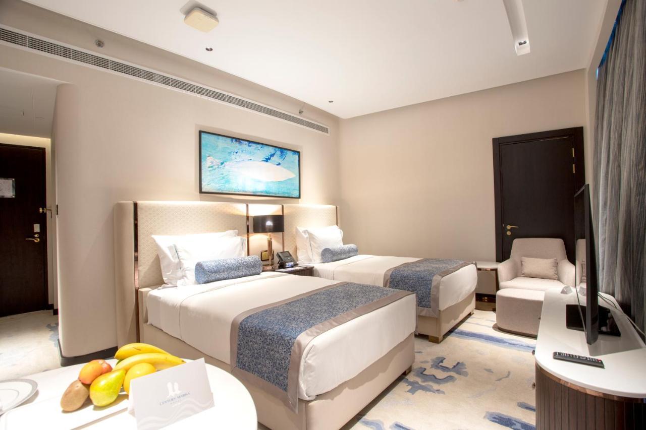 Century Marina Hotel - Lusail Bagian luar foto Deluxe Room