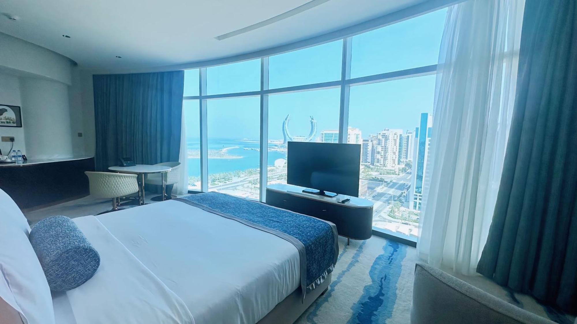Century Marina Hotel - Lusail Bagian luar foto A bedroom at the hotel